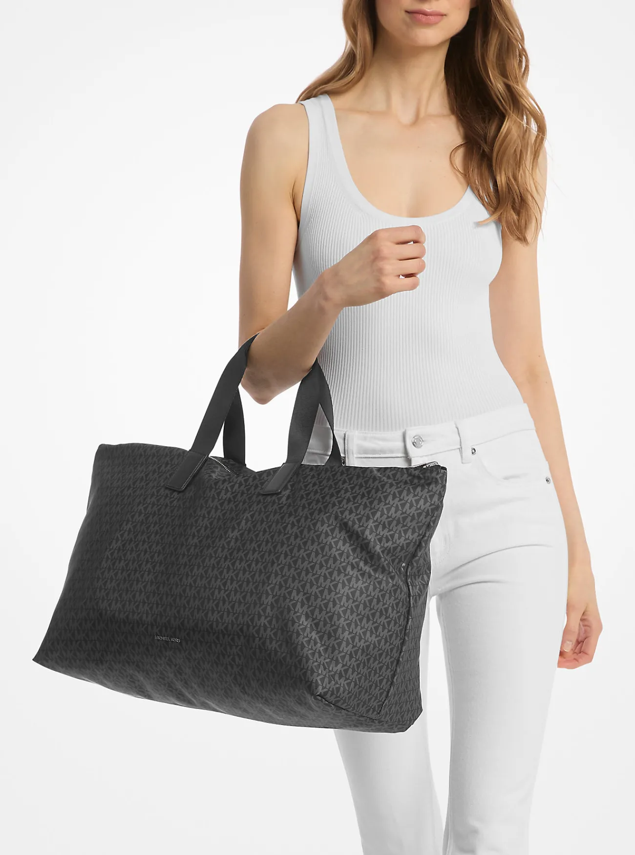 Michael Kors Draagtas Tanner met kenmerkende logoprint, omkeerbaar, opvouwbaar en groot ZWART Best