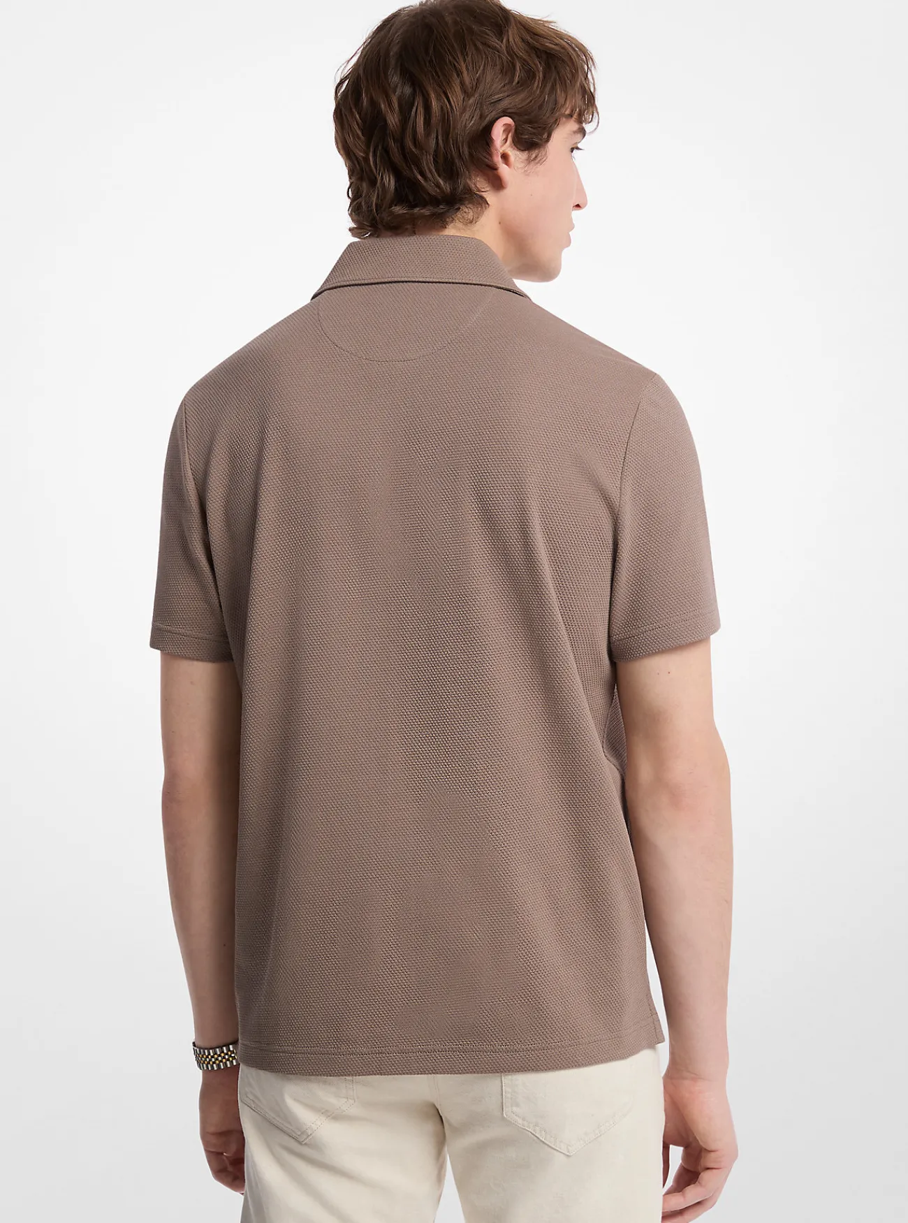 Michael Kors Poloshirt van stretchkatoen met bubbelbreisel Outlet